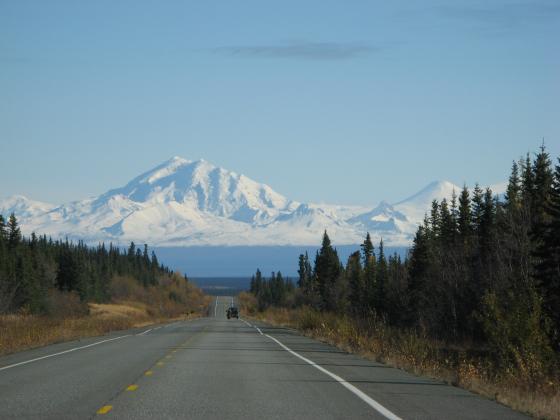 Mountain hovering over Alaska road