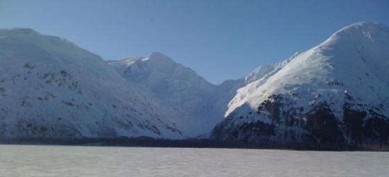 Portage, Alaska - Icy water, snow covered mountains